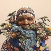 Mandela student makes MaskBook Project mask for Paris Agreement Climate Summit